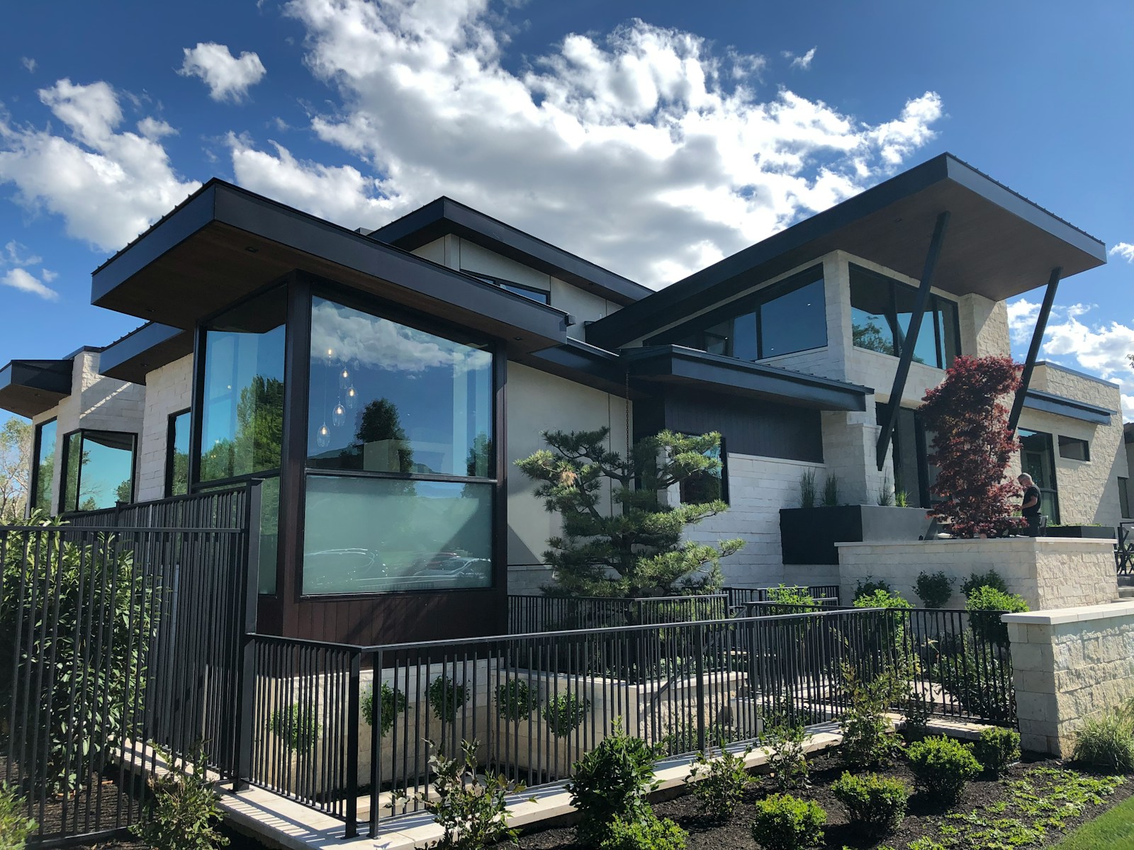 white and brown wooden house under blue sky during daytime home